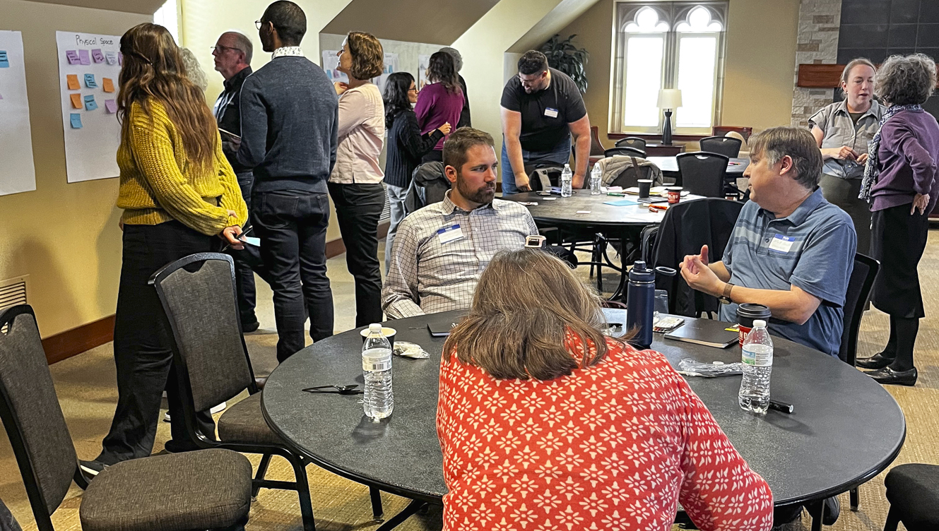 People looking at posters