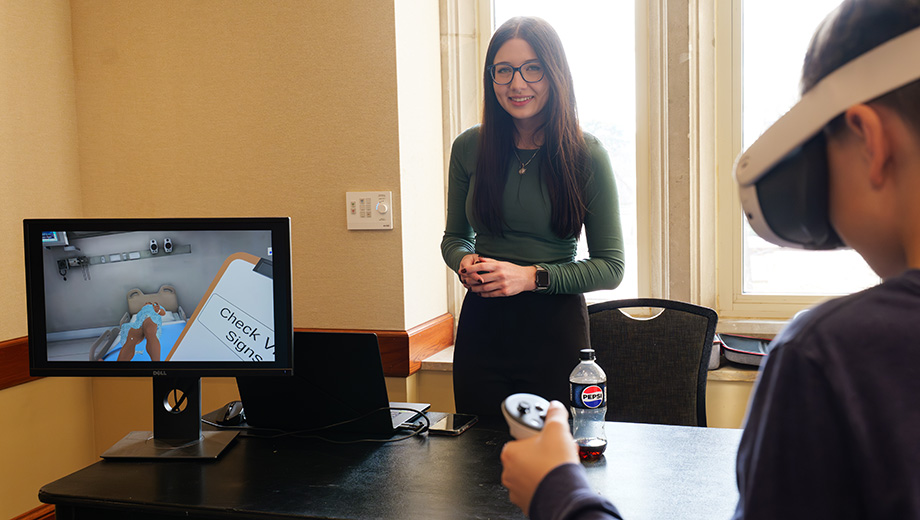 Boy wears virtual reality glasses