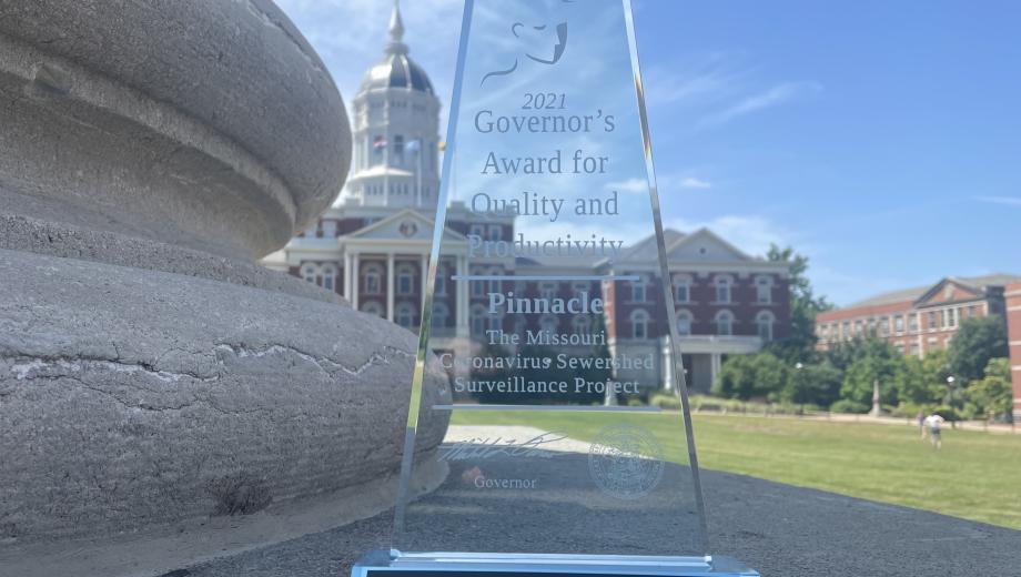 MU researchers received a 2021 Governor’s Award for Quality and Productivity. The award is pictured in front of Jesse Hall on the MU campus.
