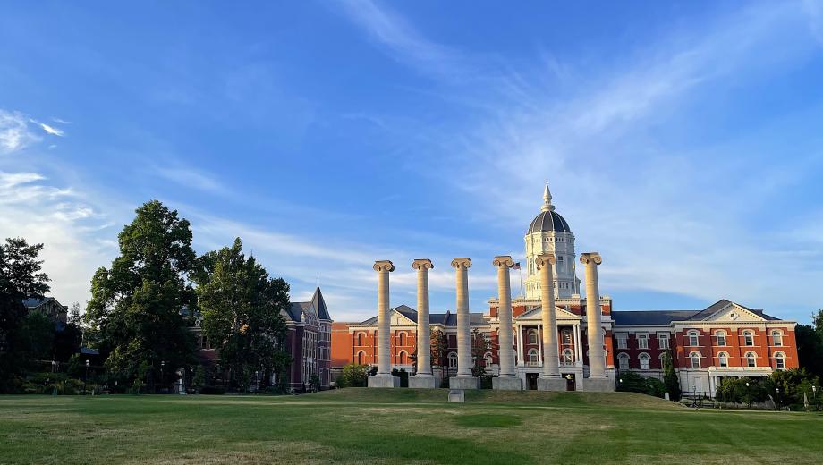 Dawn approaches on the University of Missouri campus, casting golden sunlight on the tops of the Columns and Jesse Hall on the campus’ historic Francis Quadrangle.