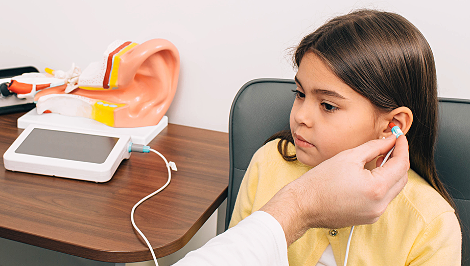 Girl having a hearing test.