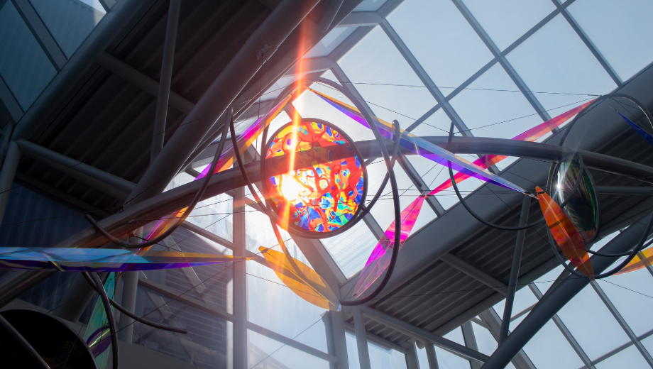 Joy of Discovery sculpture with a sunbeam in it