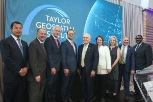 Members of the eight Missouri and Illinois research institutions forming the Taylor Geospatial Institute are joined by Andrew C. Taylor (pictured in the middle), executive chairman of Enterprise Holdings Inc. and founding chair of Greater St. Louis Inc. The Taylor Geospatial Institute is funded by a legacy investment by Taylor with supporting investments from each of the eight member institutions. Also pictured, second from right, is Dr. Tom Spencer, vice chancellor for research at Mizzou.