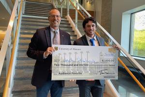 EQ Director Greg Bier, left, poses with audience favorite, Jack Bishop, who won $2,000 for Bishop Athlete Representation, a company that helps athletes land brand deals, marketing and community engagement opportunities.